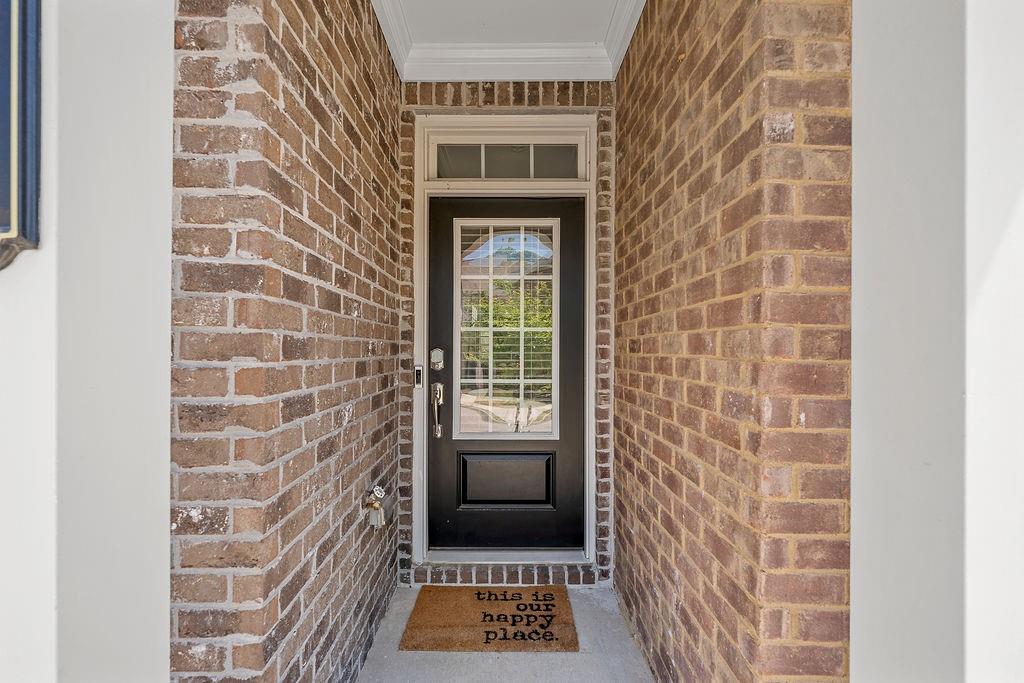 922 Edwin Lane Sugar Hill, GA 30518 - Photo 3 of 43 a view of a brick house with a large window