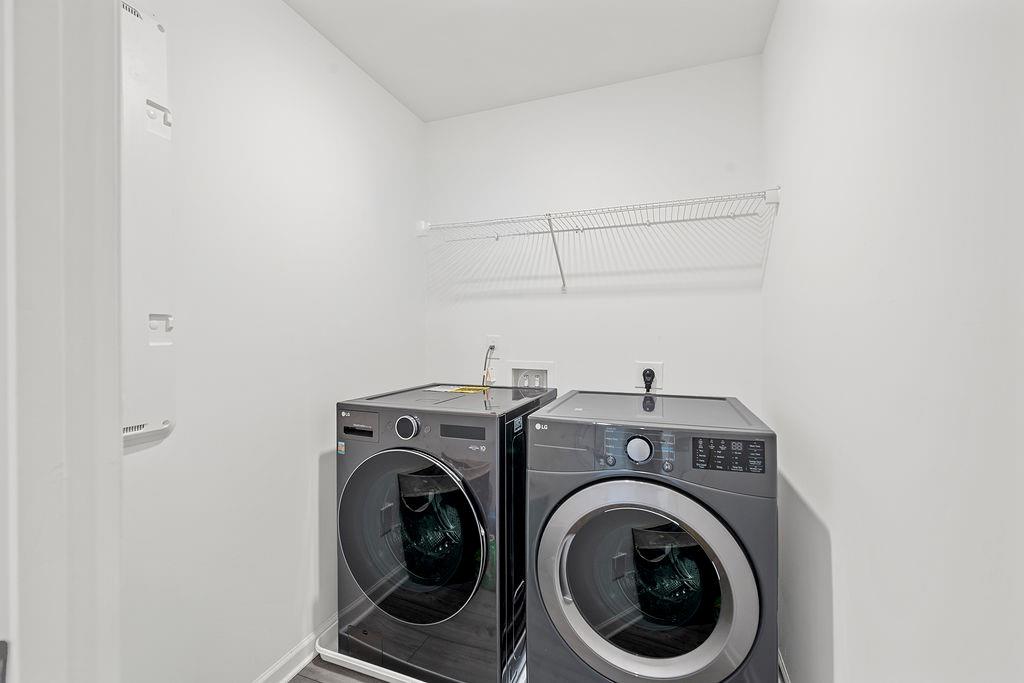 922 Edwin Lane Sugar Hill, GA 30518 - Photo 32 of 43 a utility room with dryer and washer