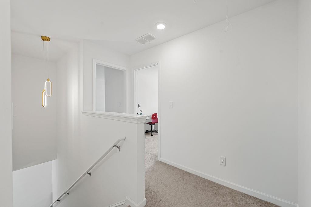 922 Edwin Lane Sugar Hill, GA 30518 - Photo 37 of 43 a view of a livingroom with an empty space