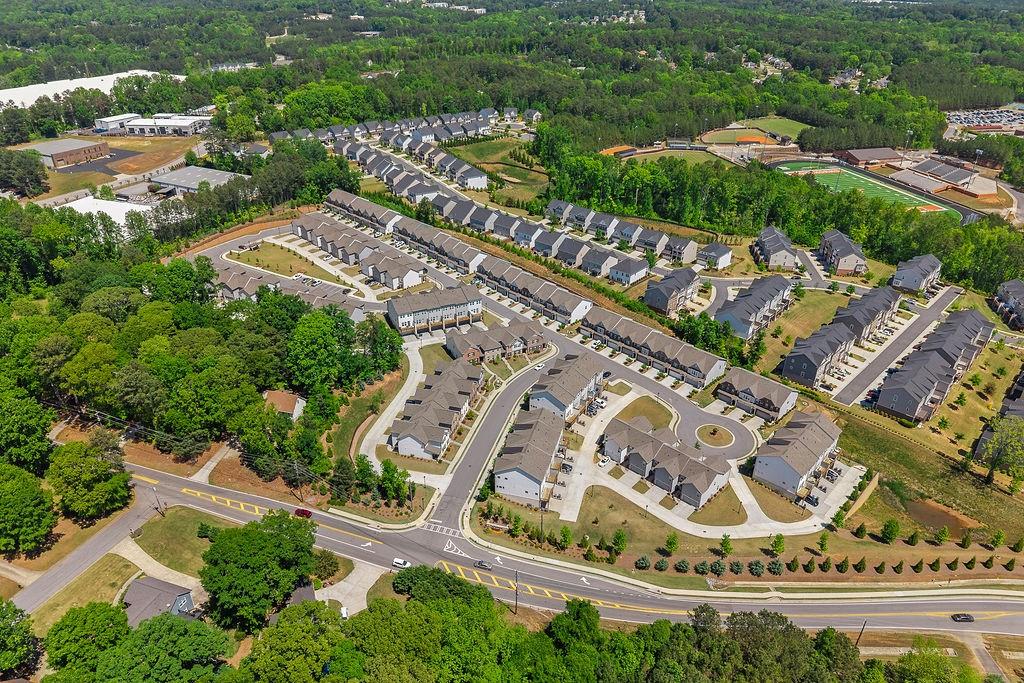 922 Edwin Lane Sugar Hill, GA 30518 - Photo 42 of 43 an aerial view of a residential building and lake view