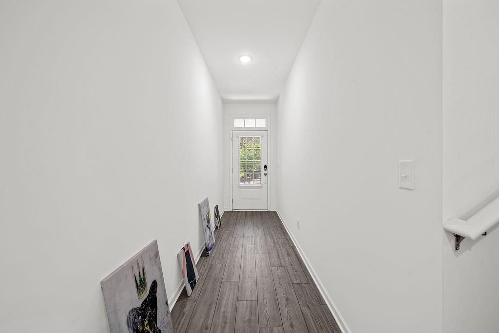 922 Edwin Lane Sugar Hill, GA 30518 - Photo 5 of 43 a view of a hallway with wooden floor