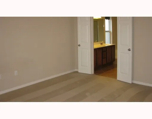 a bathroom with a bathtub a sink and a mirror