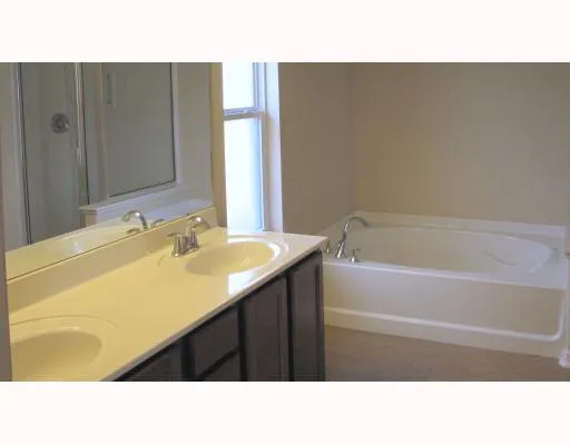 a black and white photo of a house