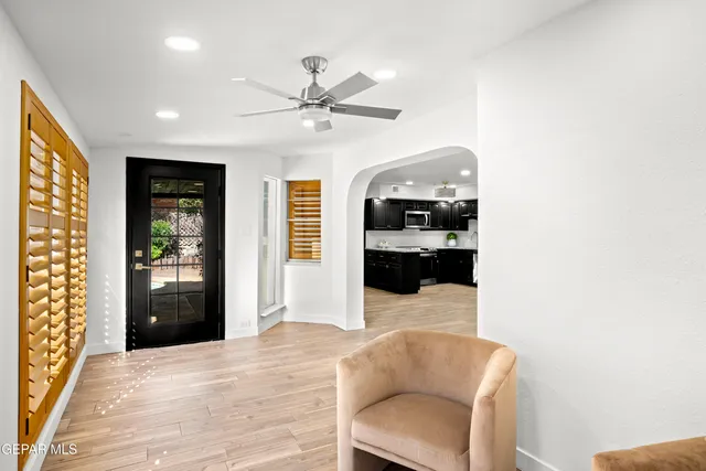 a view of an empty room with a window