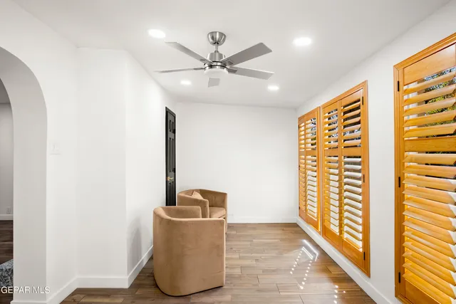 a view of a swimming pool with a porch