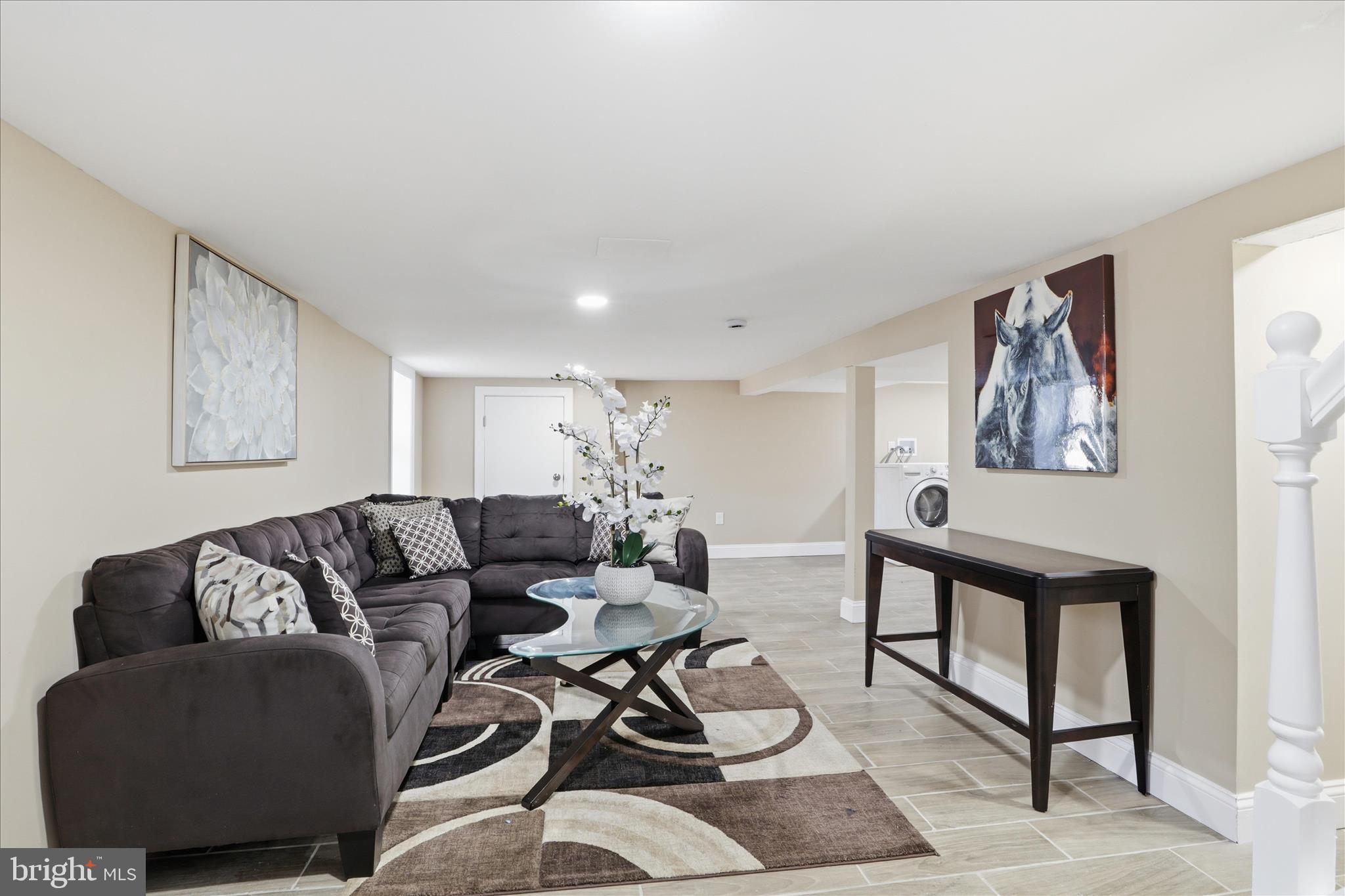 3801 West Overlea Avenue Baltimore, MD 21206 - Photo 11 of 29 a living room with furniture and a rug
