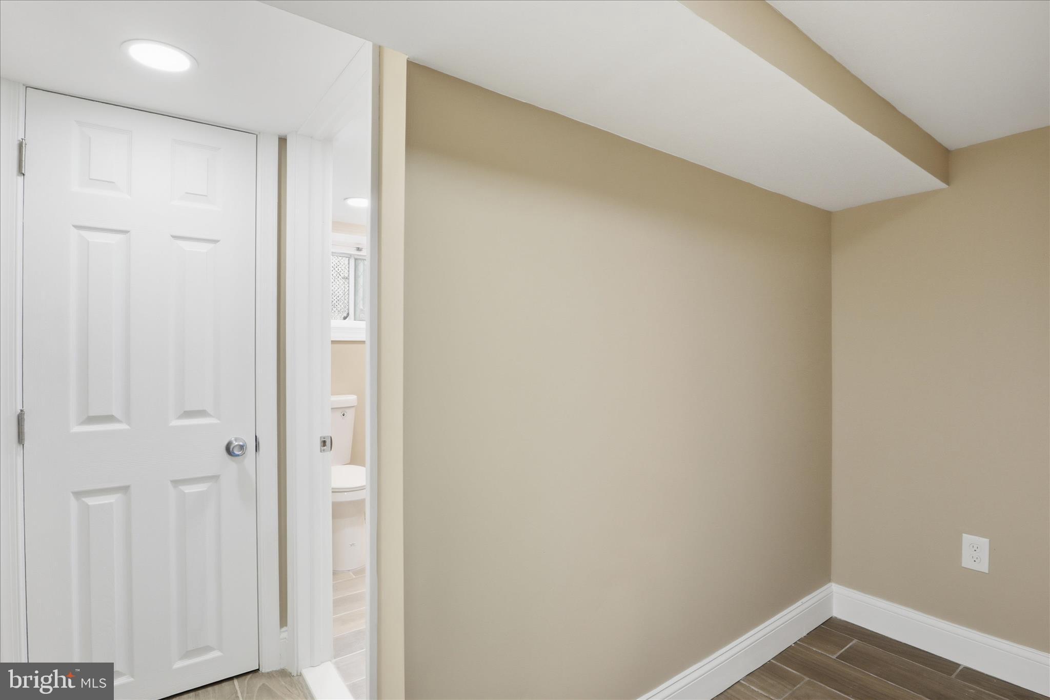 3801 West Overlea Avenue Baltimore, MD 21206 - Photo 12 of 29 a view of a hallway with wooden floor