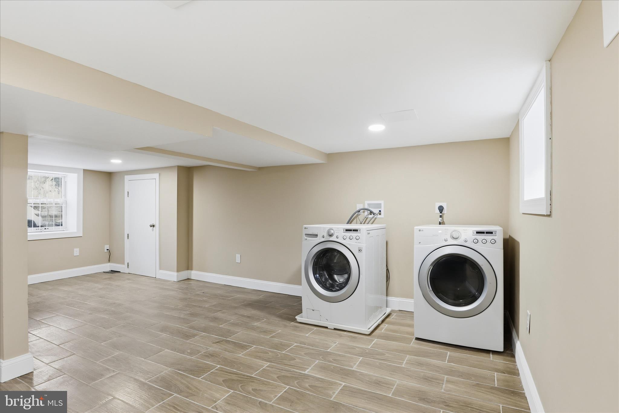 3801 West Overlea Avenue Baltimore, MD 21206 - Photo 15 of 29 a view of a storage & utility room with a washer dryer