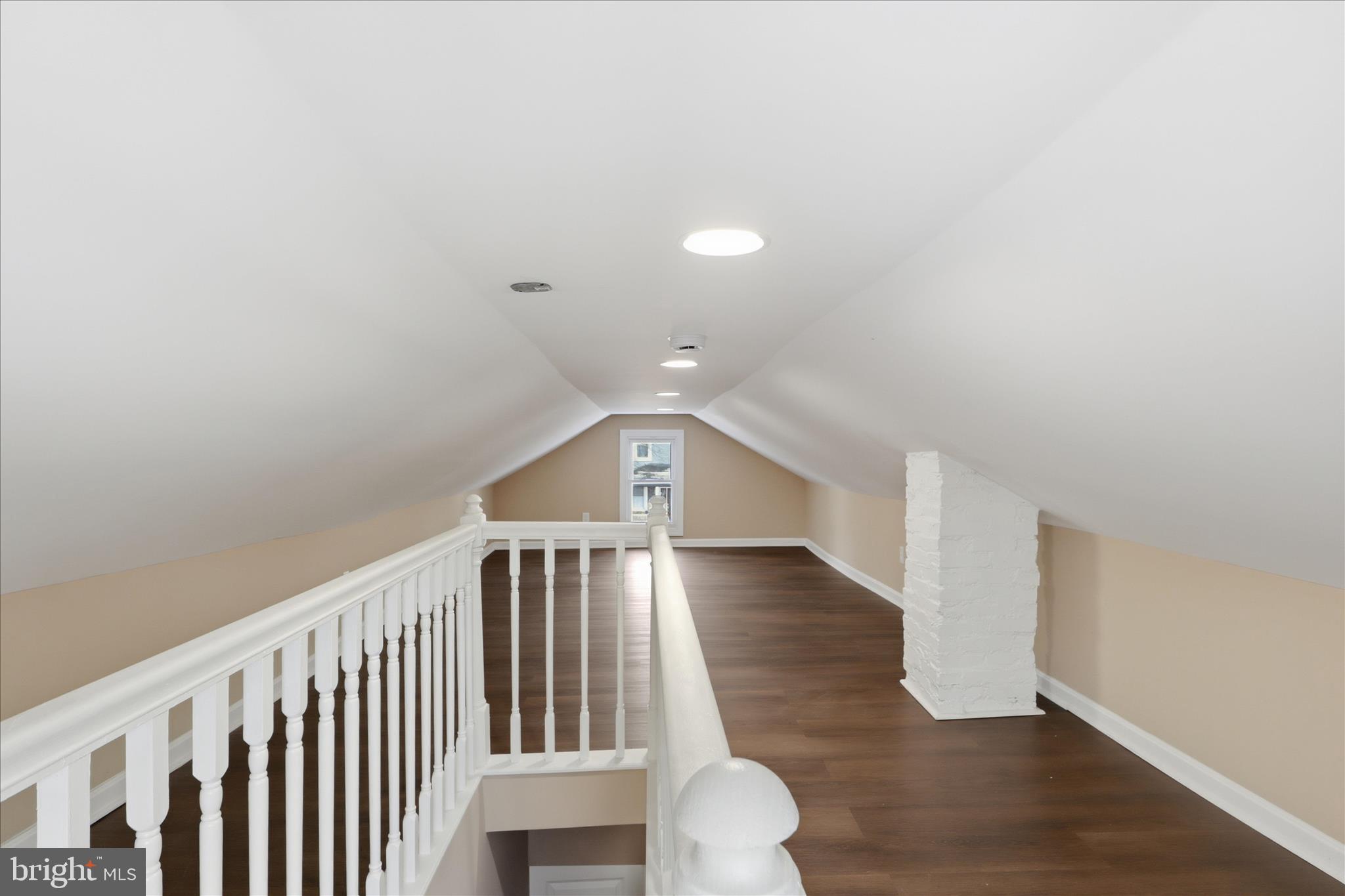 3801 West Overlea Avenue Baltimore, MD 21206 - Photo 16 of 29 a view of staircase with wooden floor and white walls