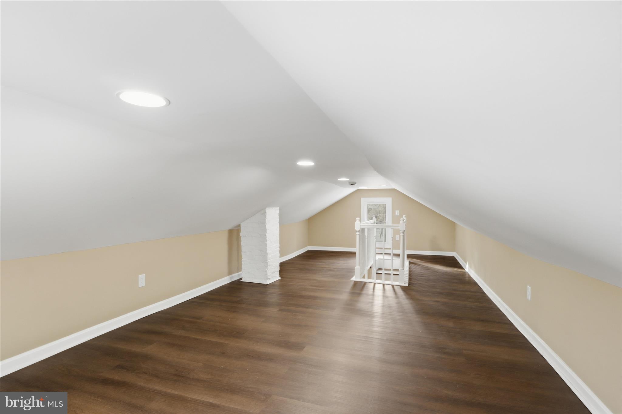3801 West Overlea Avenue Baltimore, MD 21206 - Photo 17 of 29 a view of an empty room with wooden floor