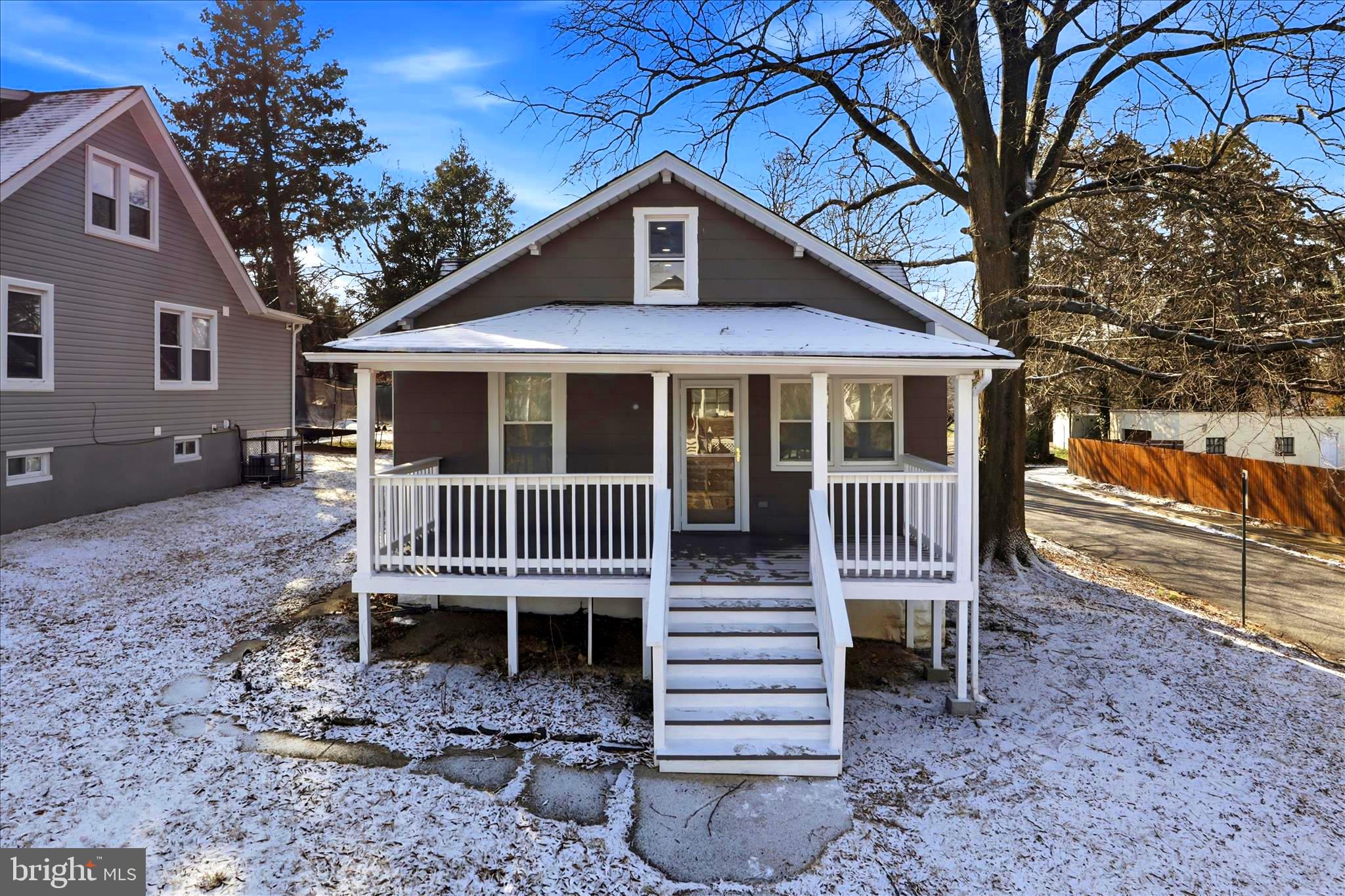 3801 West Overlea Avenue Baltimore, MD 21206 - Photo 18 of 29 a view of a house with a yard and deck
