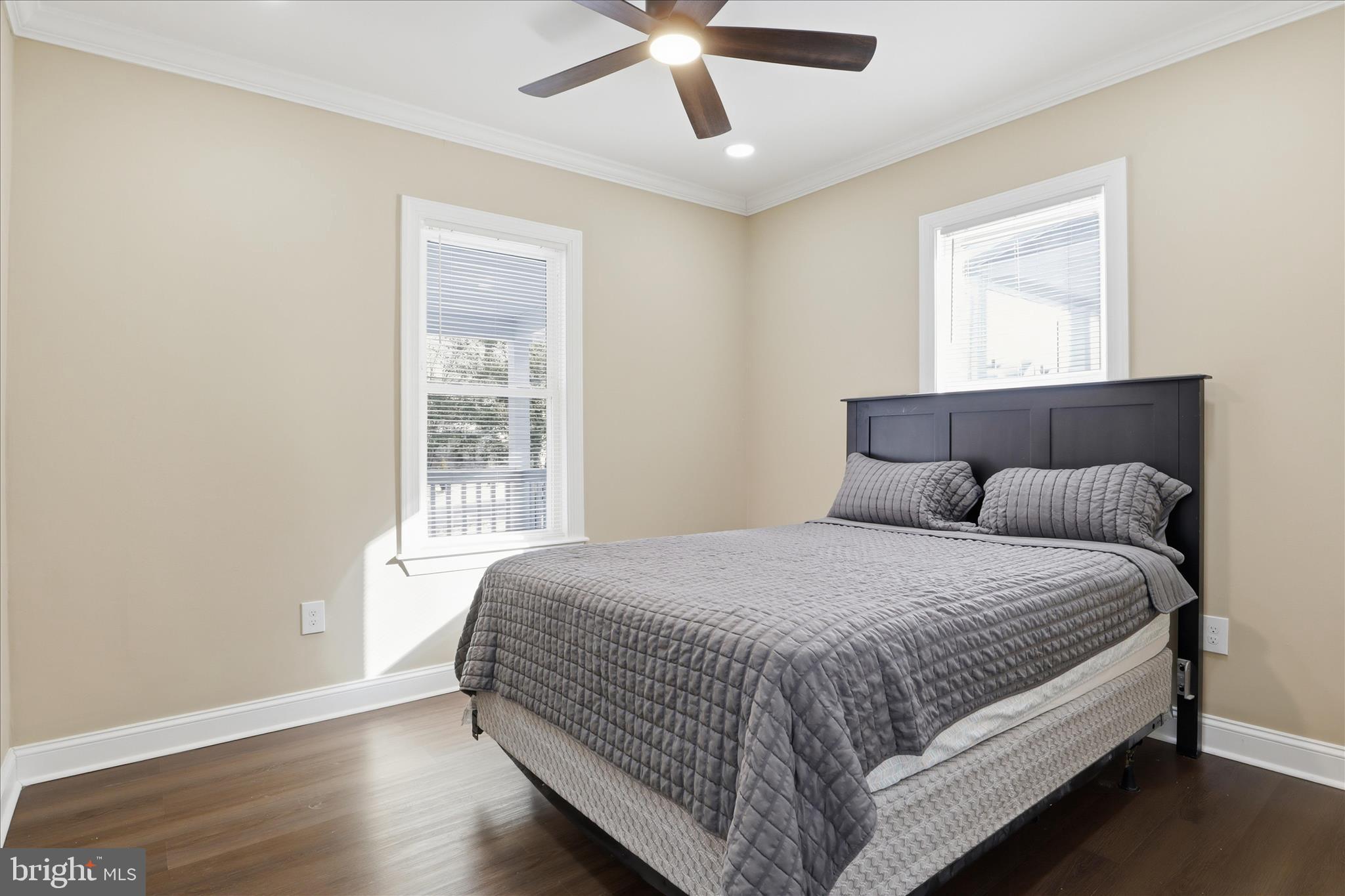 3801 West Overlea Avenue Baltimore, MD 21206 - Photo 6 of 29 a bedroom with a bed and window