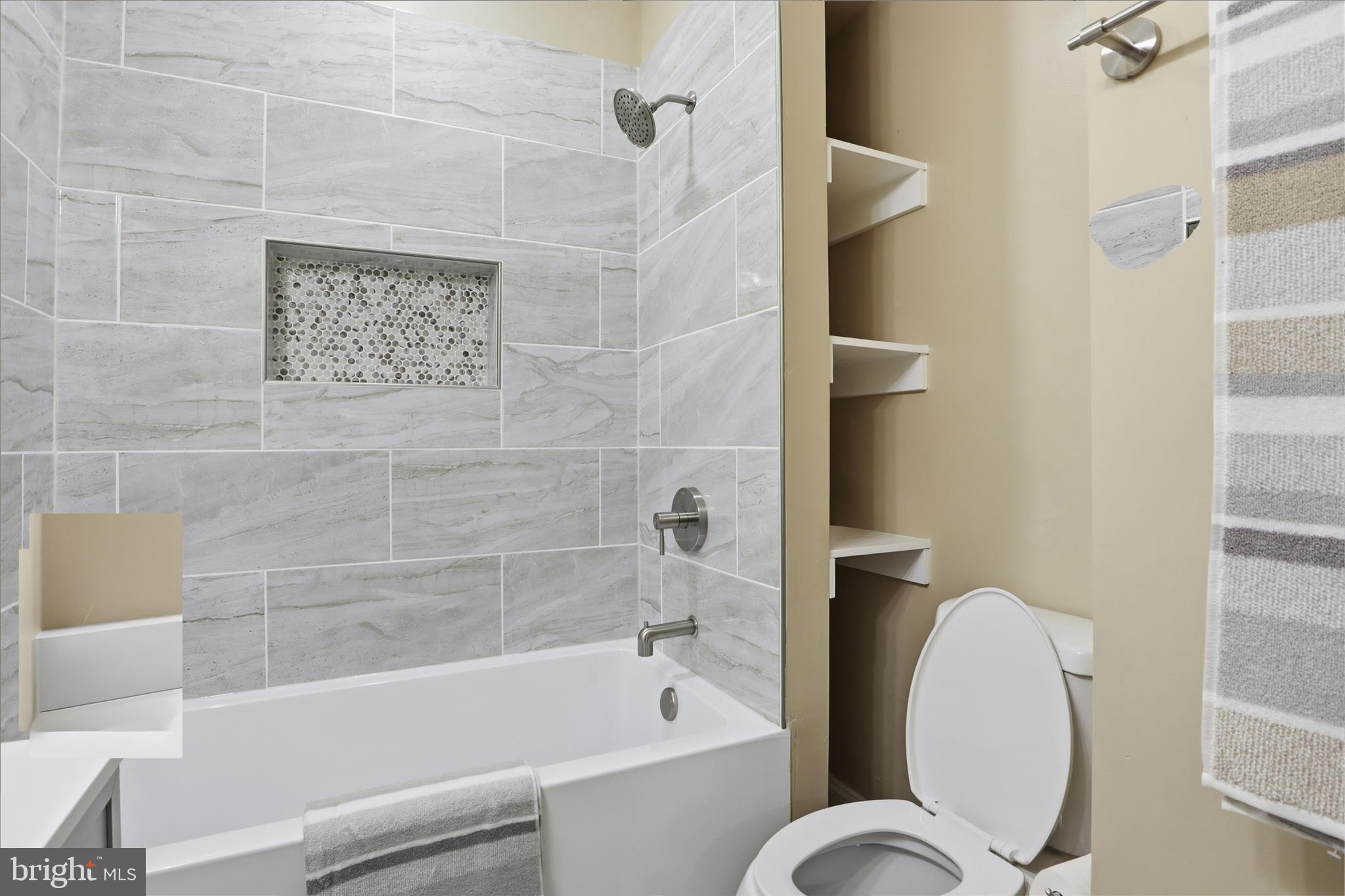 3801 West Overlea Avenue Baltimore, MD 21206 - Photo 9 of 29 a bathroom with a bathtub and a shower