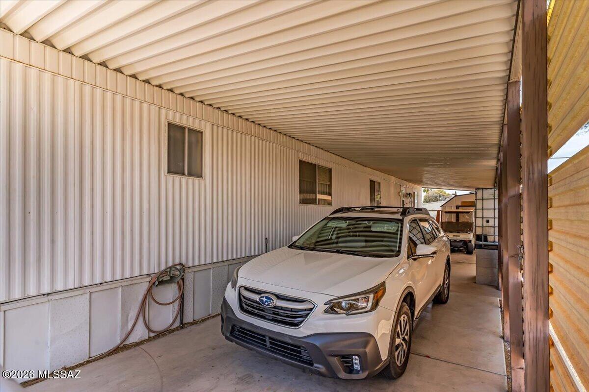 5379 West Rafter Cir Street Tucson, AZ 85713 - Photo 34 of 38 a car parked in front of a house
