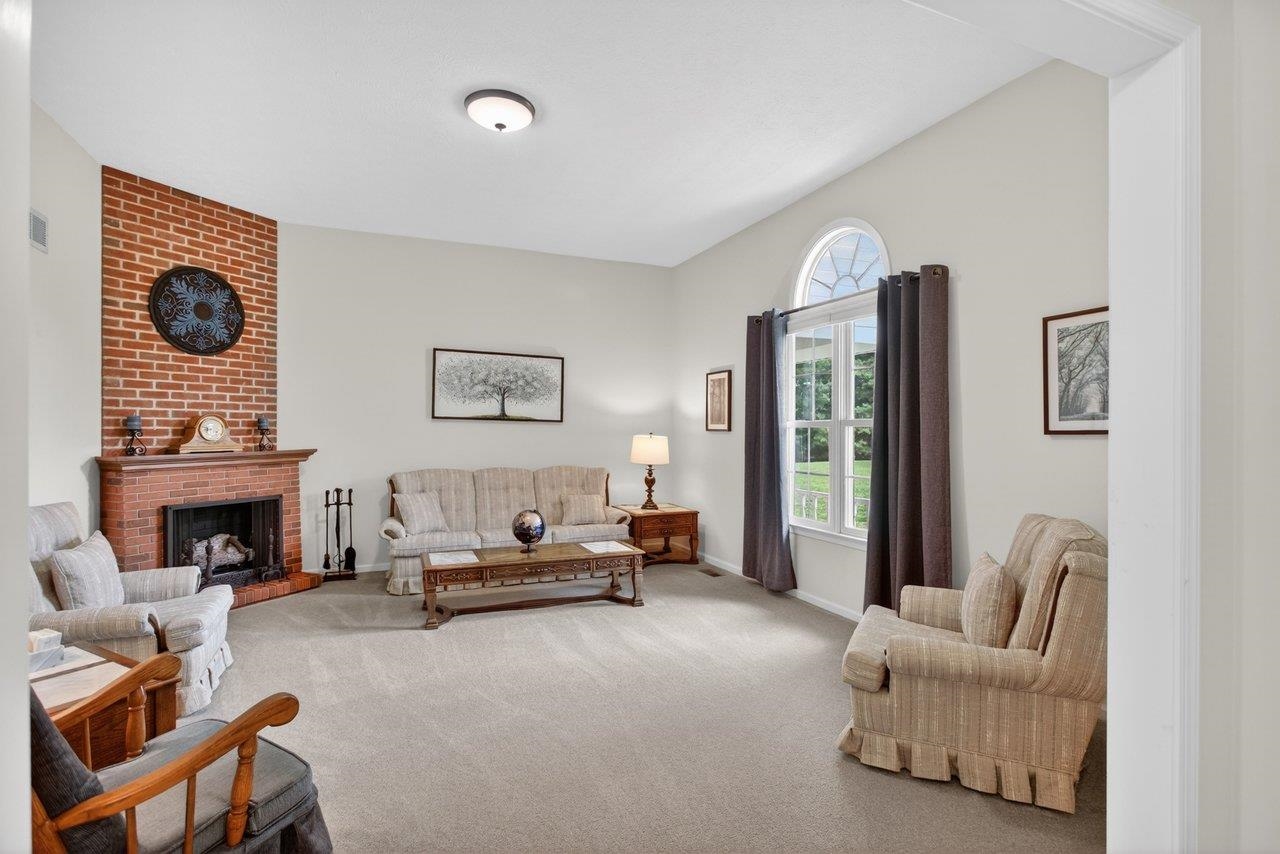 2220 Pine Woods Road Quicksburg, VA 22847 - Photo 34 of 75 Features; gas fireplace, high ceiling, and carpet