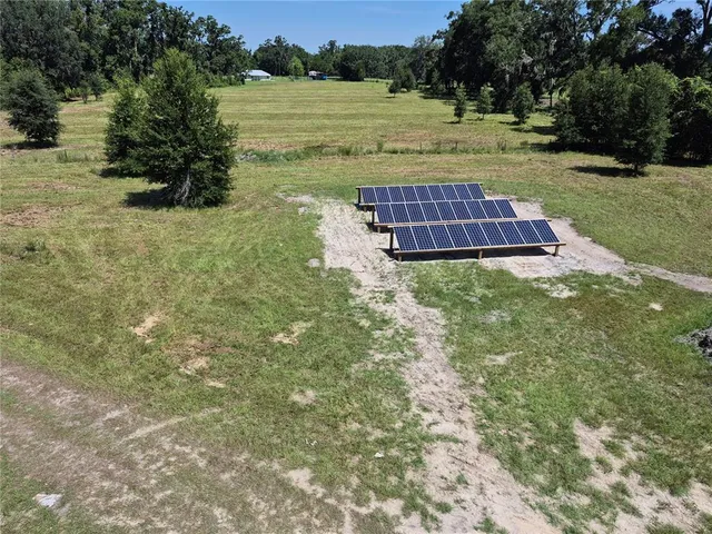 a view of a yard with an outdoor space