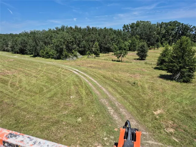 a outdoor view of house with green space