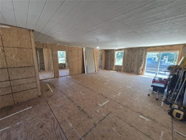a view of a livingroom with a lounge chair