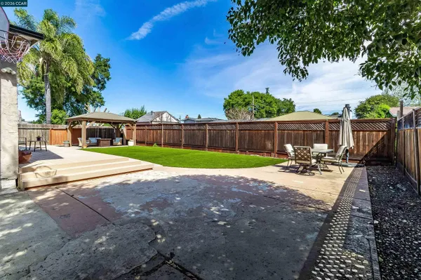 a view of a backyard with a garden and plants