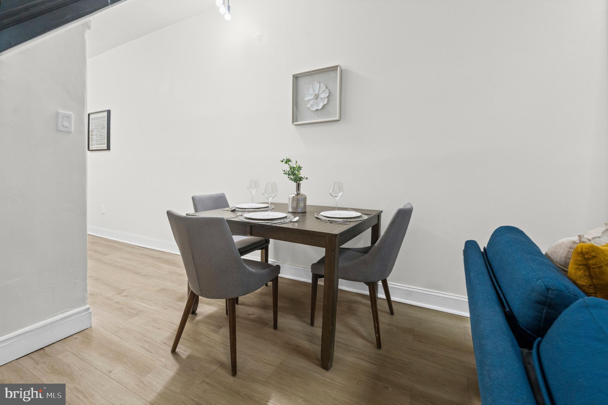 1135 Myrtle Avenue Baltimore, MD 21201 - Photo 11 of 31 Room for full dining set.