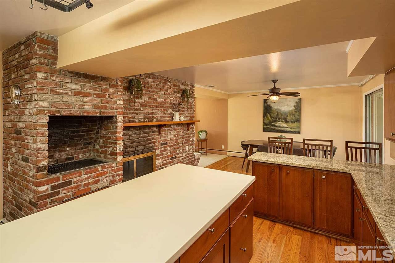 1425 Marsh Avenue Reno, NV 89509 - Photo 11 of 40 a view of a kitchen with furniture and flat screen tv