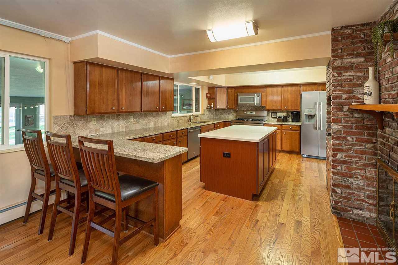 1425 Marsh Avenue Reno, NV 89509 - Photo 12 of 40 a kitchen with a sink appliances and cabinets