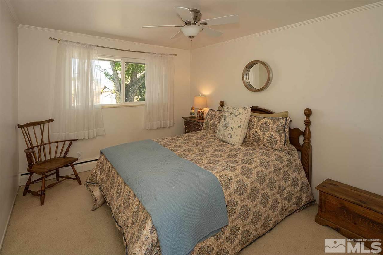1425 Marsh Avenue Reno, NV 89509 - Photo 23 of 40 a bedroom with a bed and window
