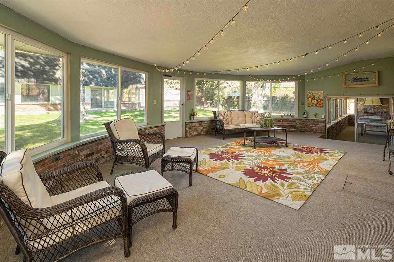 1425 Marsh Avenue Reno, NV 89509 - Photo 26 of 40 a living room with furniture and a large window