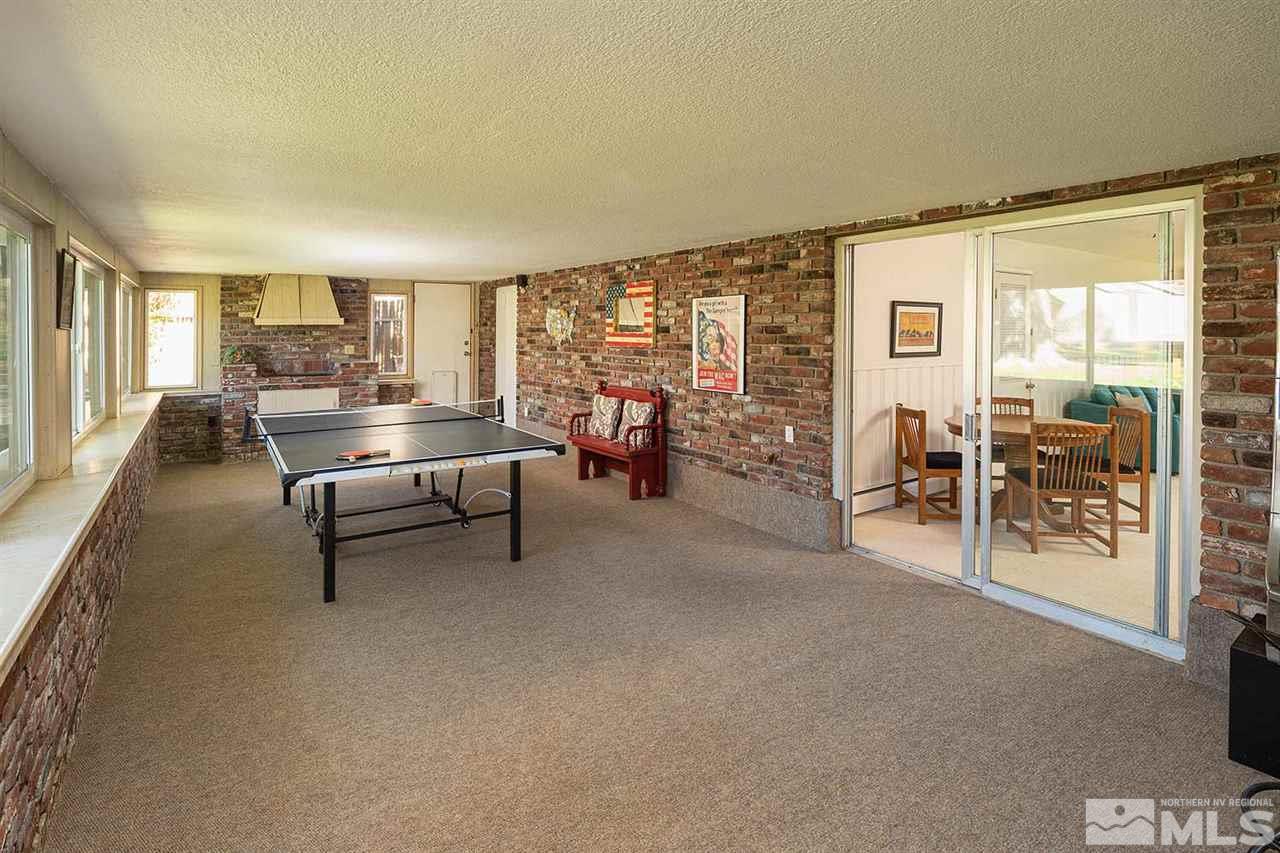 1425 Marsh Avenue Reno, NV 89509 - Photo 28 of 40 a view of a livingroom with furniture and floor to ceiling window