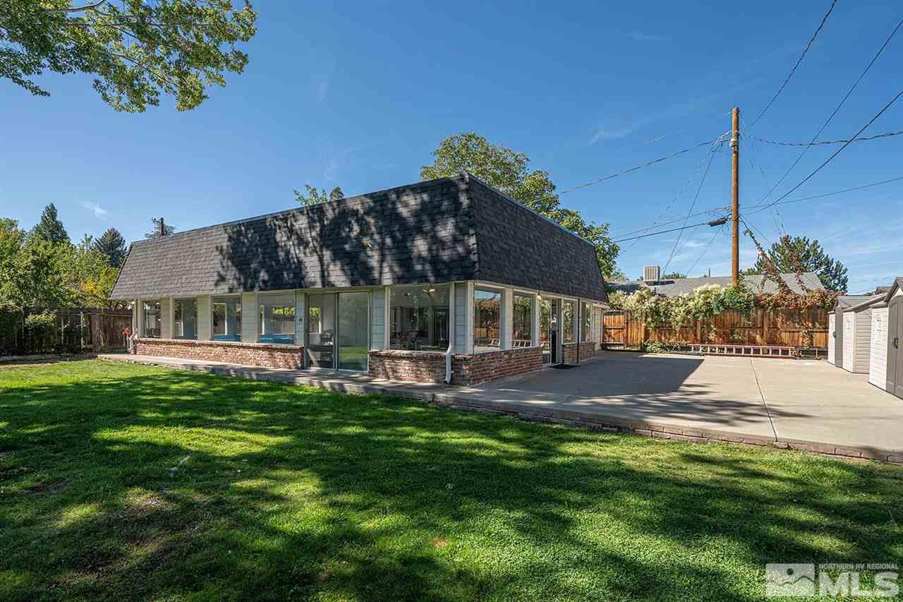 1425 Marsh Avenue Reno, NV 89509 - Photo 4 of 40 a view of a house with a yard and sitting area