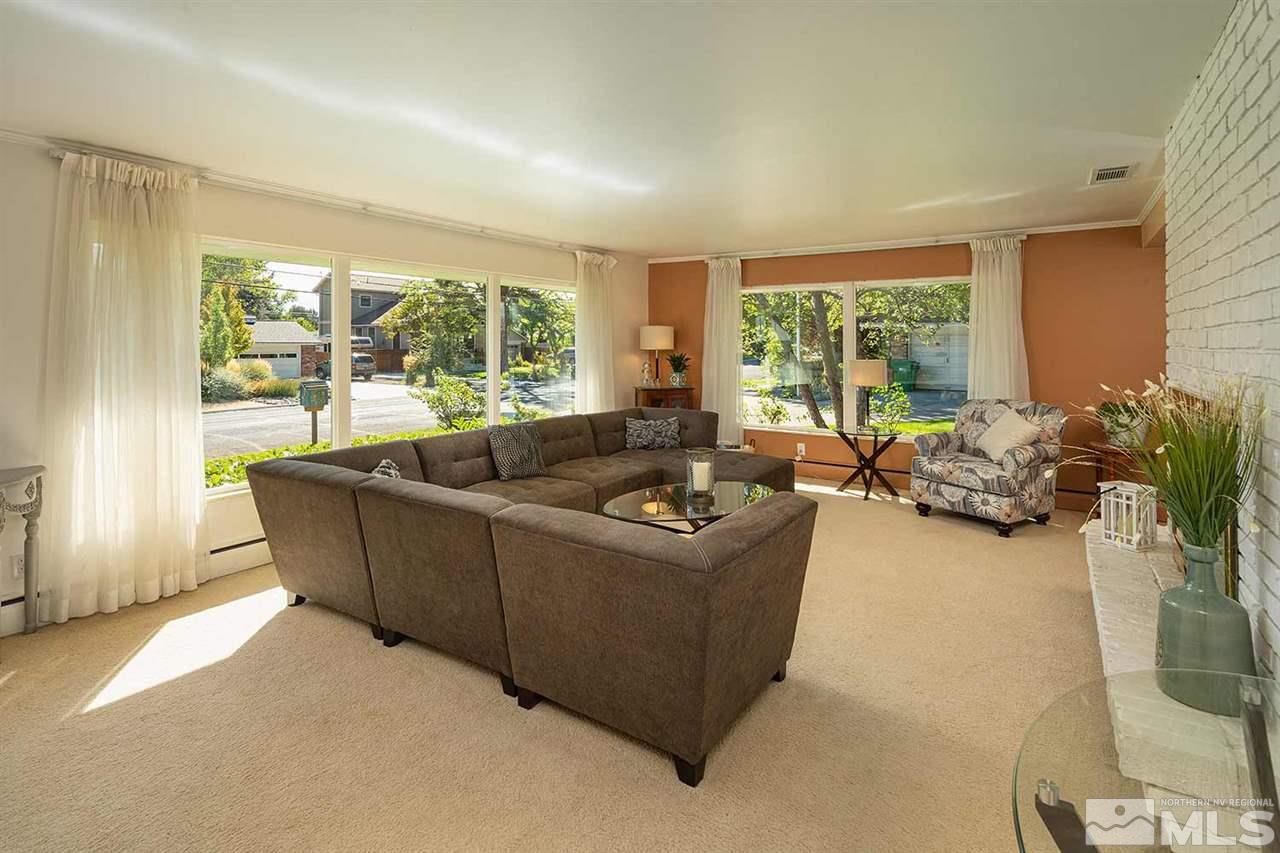 1425 Marsh Avenue Reno, NV 89509 - Photo 6 of 40 a living room with furniture and a large window