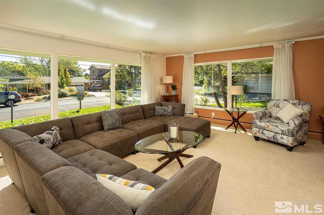 1425 Marsh Avenue Reno, NV 89509 - Photo 7 of 40 a living room with furniture and large windows