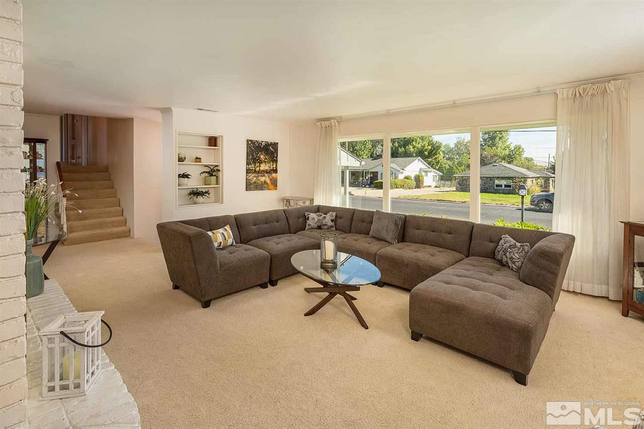 1425 Marsh Avenue Reno, NV 89509 - Photo 9 of 40 a living room with furniture and a large window