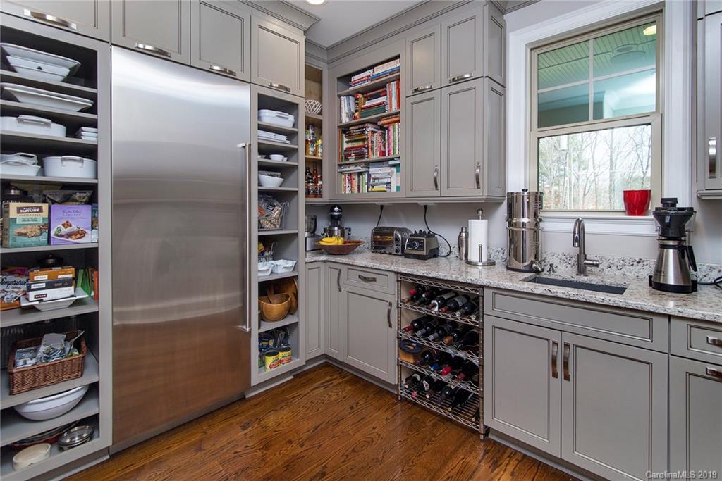 210 Patternote Road, Unit 31 Mooresville, NC 28117 - Photo 8 of 29 a kitchen with stainless steel appliances a refrigerator and a window