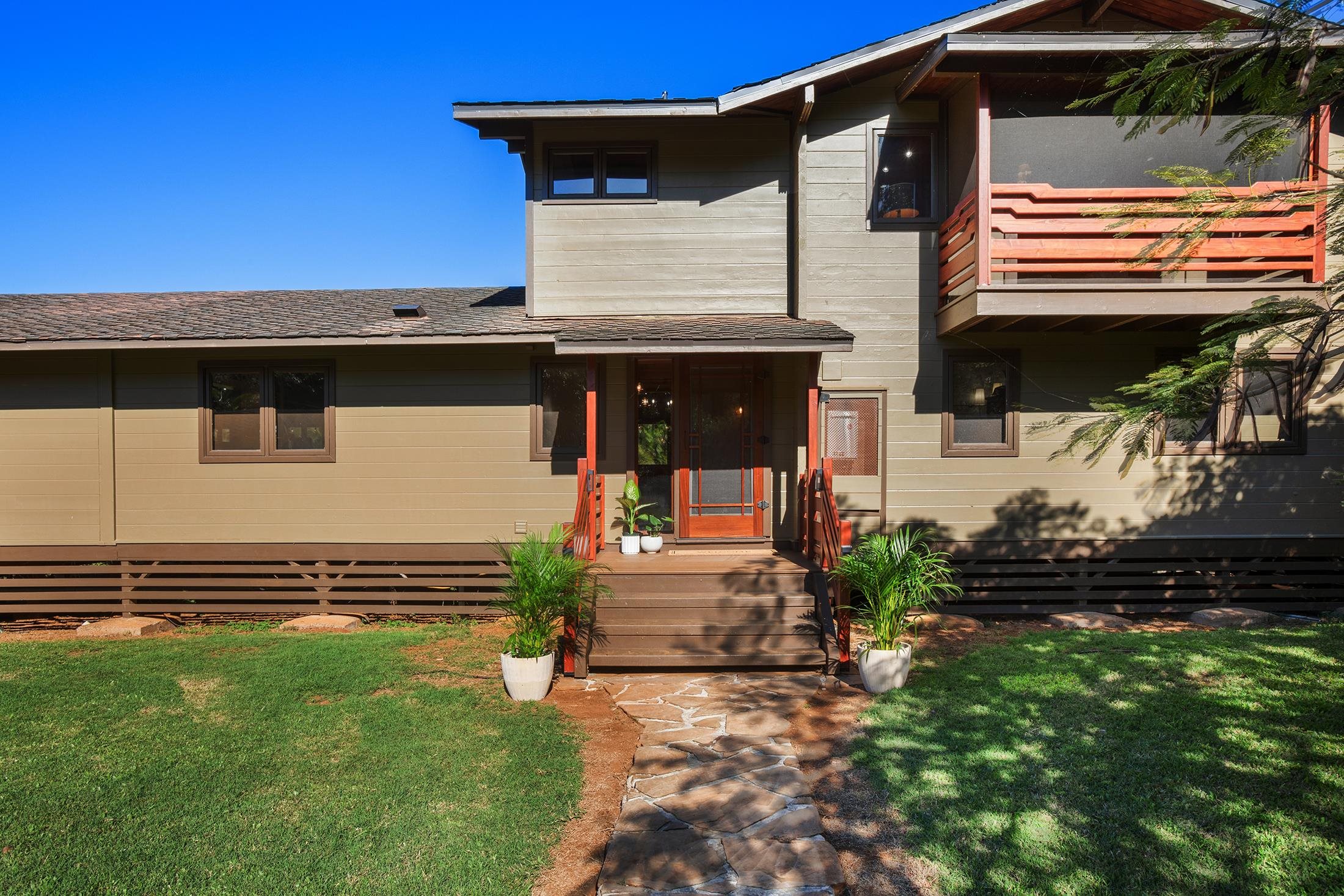 30 Mamao Place Haiku, HI 96708 - Photo 2 of 50 a front view of a house with garden