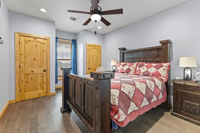 a bedroom with bed and window