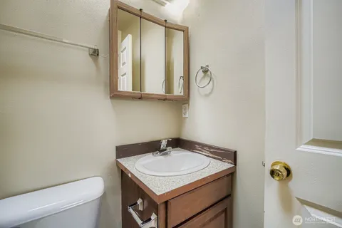 a bathroom with a sink and a toilet
