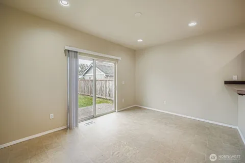 an empty room with sliding door