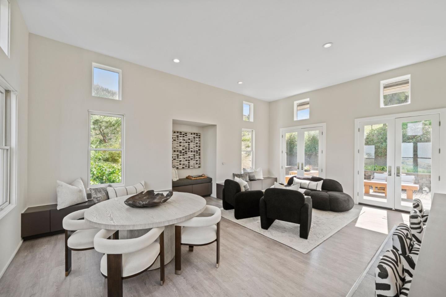 2698 Greenrock Road Milpitas, CA 95035 - Photo 21 of 99 a living room with furniture a wooden floor and a large window