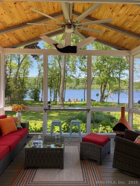 3 Conn River Road East Haddam, CT 06423 - Photo 5 of 22 a living room filled with furniture and a floor to ceiling window