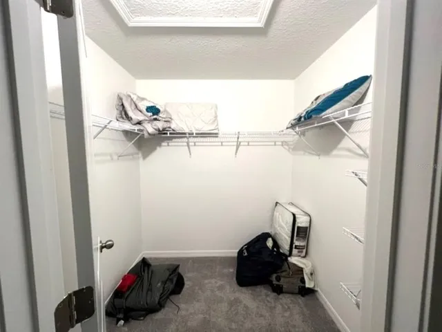 a room with storage and utility