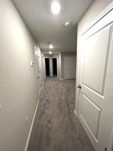 a view of hallway with stairs