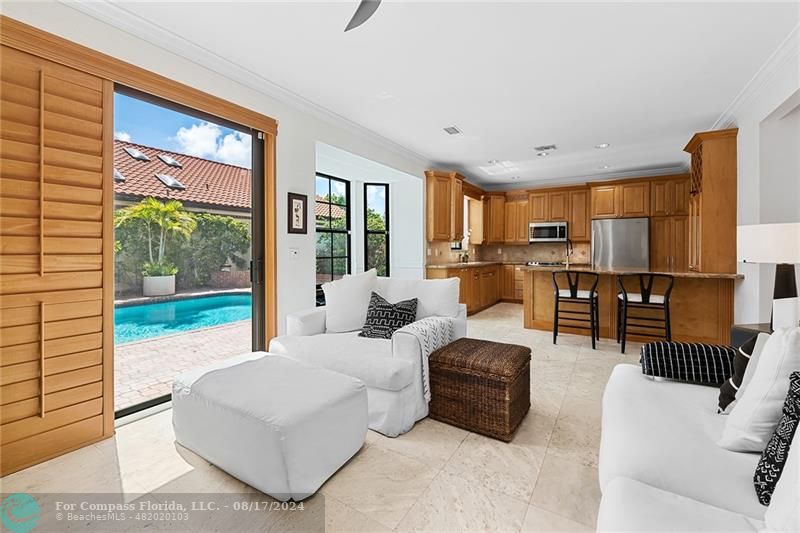 23285 Mirabella Circle Boca Raton, FL 33433 - Photo 15 of 31 a bedroom with furniture and large windows