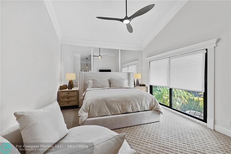 23285 Mirabella Circle Boca Raton, FL 33433 - Photo 18 of 31 a bedroom with furniture and a large window