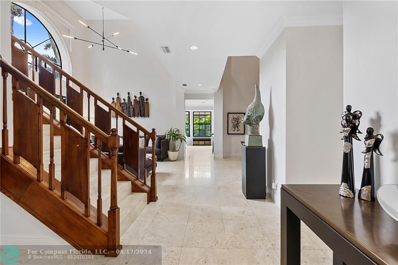 23285 Mirabella Circle Boca Raton, FL 33433 - Photo 4 of 31 a view of entryway and hall with dining room