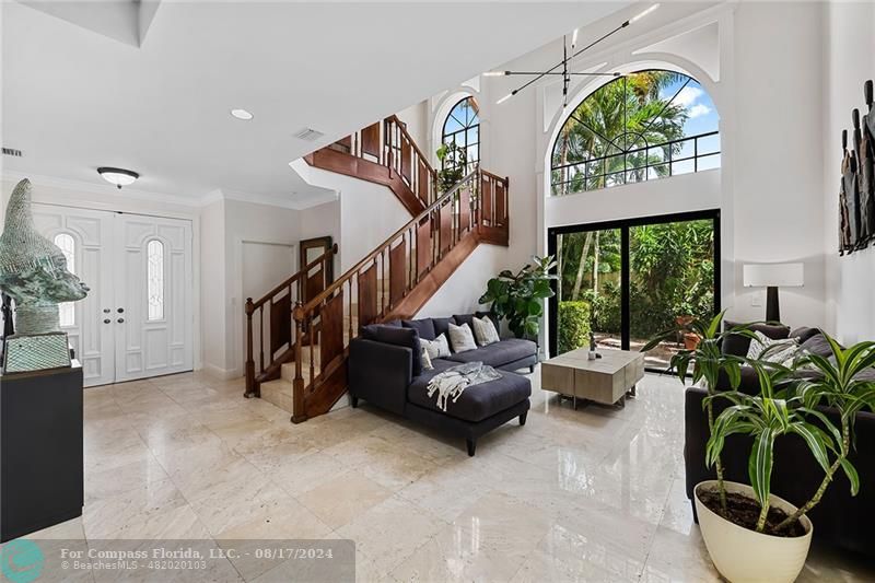 23285 Mirabella Circle Boca Raton, FL 33433 - Photo 6 of 31 a living room with furniture and a large window