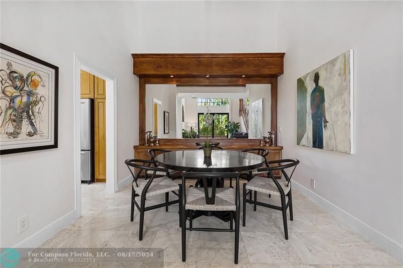 23285 Mirabella Circle Boca Raton, FL 33433 - Photo 9 of 31 a view of a dining room with furniture and window