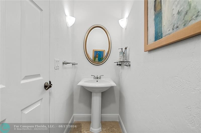 23285 Mirabella Circle Boca Raton, FL 33433 - Photo 10 of 31 a bathroom with a sink and a mirror