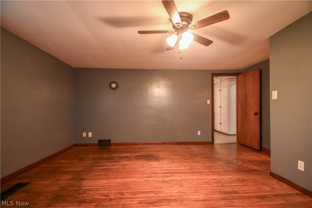 9506 Kirk Road North Jackson, OH 44451 - Photo 26 of 50 Unfurnished room featuring ceiling fan and hardwood / wood-style flooring