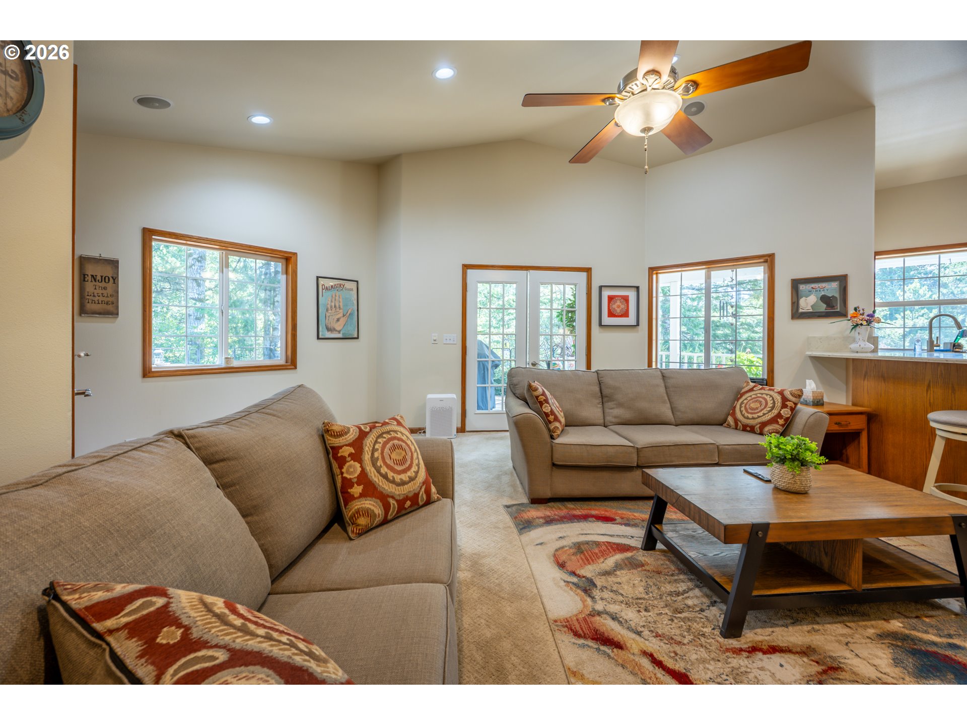 2193 13th Street Florence, OR 97439 - Photo 25 of 48 a living room with furniture a rug and a window